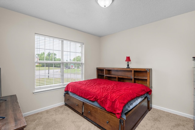 762 Winding Creek Ct, Evans, GA 30809 - carpeted bedroom with multiple windows, baseboards, and a textured ceiling