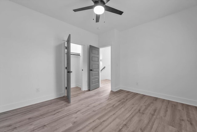 1017 Miller St, Augusta, GA 30901 - unfurnished bedroom featuring light wood-style flooring, baseboards, a ceiling fan, and a closet