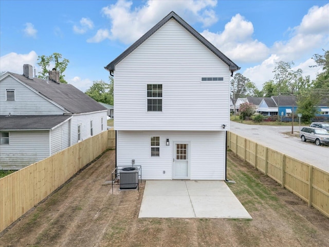 1017 Miller St, Augusta, GA 30901 - rear view of house with cooling unit and a patio