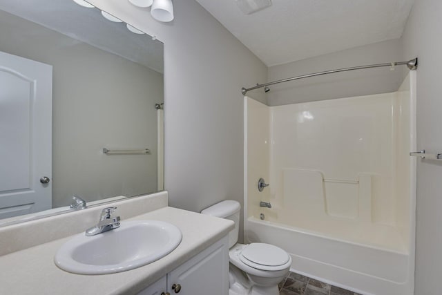 full bathroom featuring vanity, shower / bathing tub combination, a textured ceiling, and toilet