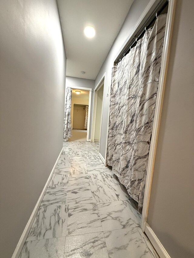 1420 Sawmill Trl, Grovetown, GA 30813 - hallway featuring marble look tile flooring and baseboards