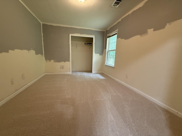 1420 Sawmill Trl, Grovetown, GA 30813 - unfurnished bedroom with baseboards, crown molding, a closet, and light colored carpet
