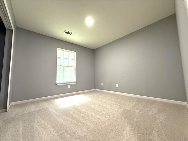 1420 Sawmill Trl, Grovetown, GA 30813 - spare room featuring baseboards and light carpet