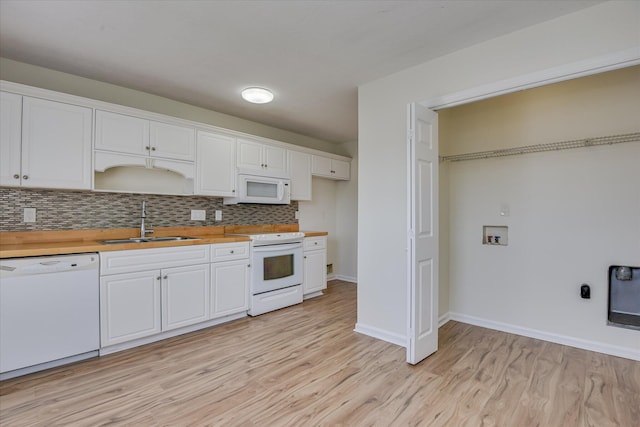 1532 Abby Way, Augusta, GA 30909 - kitchen with white appliances, tasteful backsplash, light wood-style flooring, white cabinetry, and wooden counters