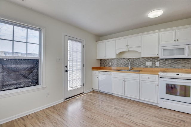 1532 Abby Way, Augusta, GA 30909 - kitchen featuring white appliances, decorative backsplash, light wood-style floors, white cabinets, and wooden counters