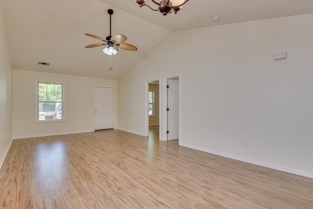 1532 Abby Way, Augusta, GA 30909 - empty room featuring light wood-style flooring, ceiling fan, a chandelier, and high vaulted ceiling