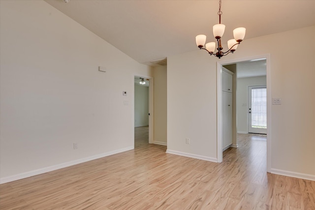 1532 Abby Way, Augusta, GA 30909 - empty room with a chandelier, light wood-type flooring, and vaulted ceiling