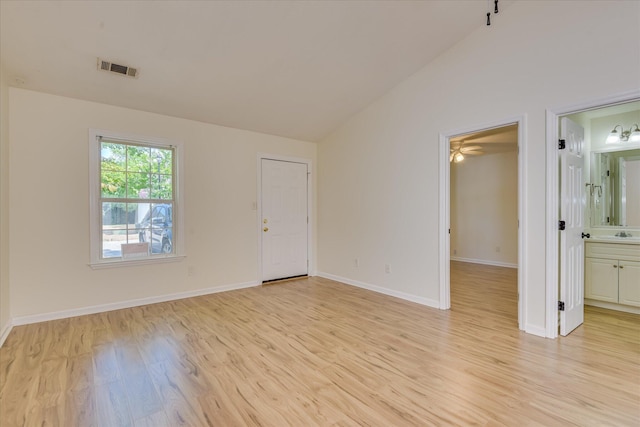 1532 Abby Way, Augusta, GA 30909 - unfurnished room with light wood finished floors, vaulted ceiling, and a ceiling fan