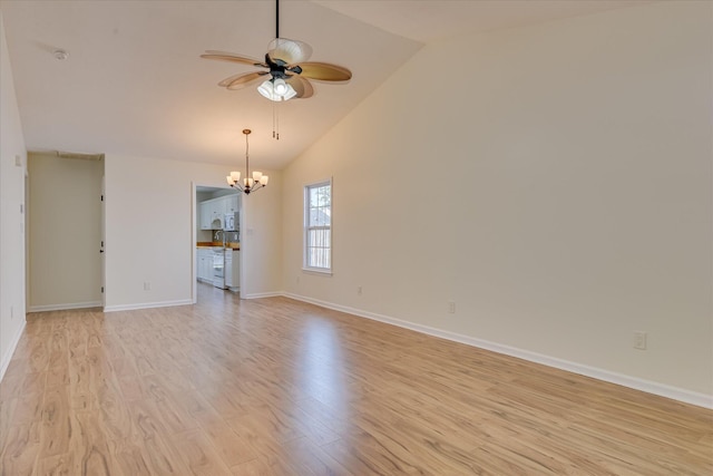 1532 Abby Way, Augusta, GA 30909 - spare room with a ceiling fan, a chandelier, light wood-style flooring, and vaulted ceiling