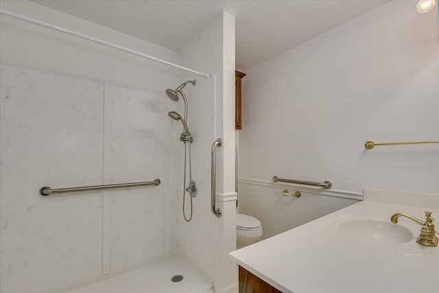 413 Mcintosh Dr, Waynesboro, GA 30830 - bathroom with vanity, toilet, and a shower