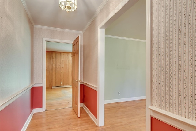 413 Mcintosh Dr, Waynesboro, GA 30830 - hall with light wood-style flooring, ornamental molding, wallpapered walls, a baseboard heating unit, and baseboards