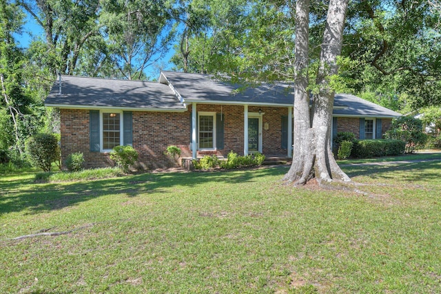 413 Mcintosh Dr, Waynesboro, GA 30830 - single story home with brick siding and a front yard