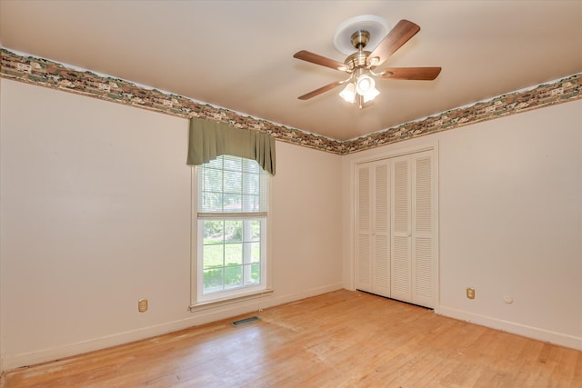 413 Mcintosh Dr, Waynesboro, GA 30830 - unfurnished room with wood finished floors, plenty of natural light, and baseboards