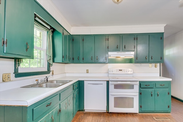 413 Mcintosh Dr, Waynesboro, GA 30830 - kitchen featuring range with two ovens, under cabinet range hood, a sink, light countertops, and light wood-type flooring
