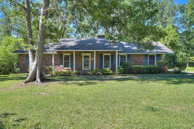 413 Mcintosh Dr, Waynesboro, GA 30830 - ranch-style home with a front yard, brick siding, and roof with shingles
