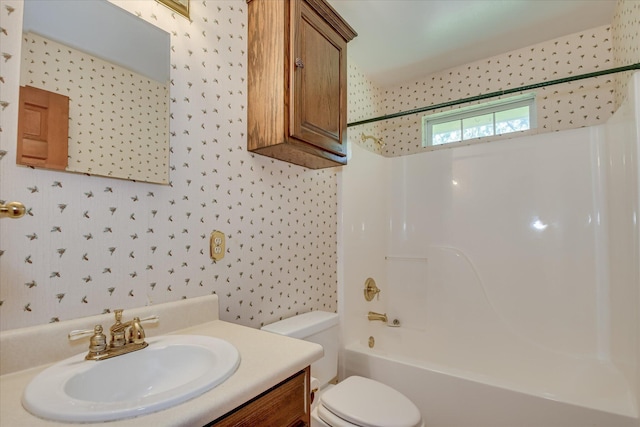413 Mcintosh Dr, Waynesboro, GA 30830 - full bathroom with toilet, vanity, shower / washtub combination, and wallpapered walls