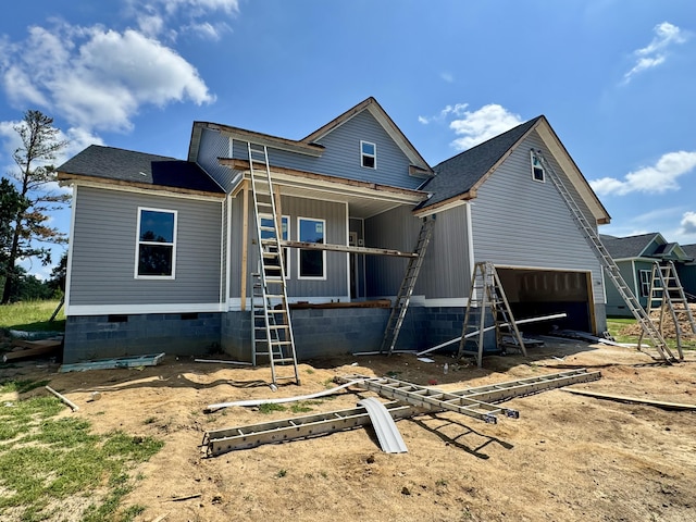 3191 Old Augusta Rd, Dearing, GA 30808 - back of property featuring crawl space, a garage, and a shingled roof