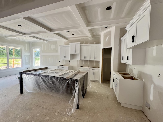 3191 Old Augusta Rd, Dearing, GA 30808 - kitchen with coffered ceiling, white cabinets, and beamed ceiling