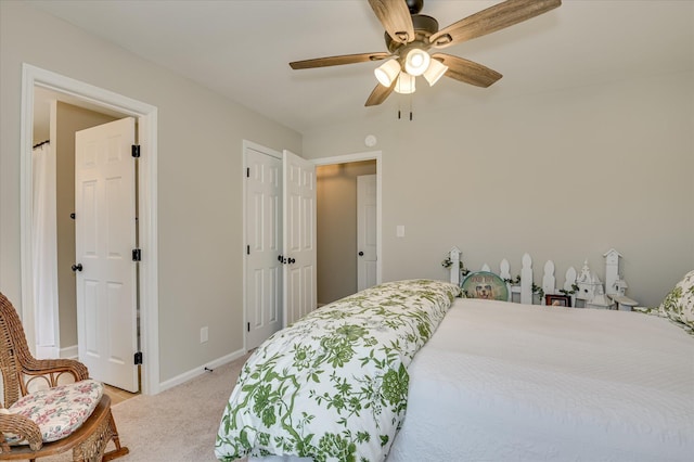 820 Barrett Ln, Augusta, GA 30909 - bedroom featuring light carpet, baseboards, and ceiling fan