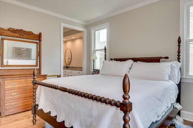 820 Barrett Ln, Augusta, GA 30909 - bedroom with multiple windows, light wood-type flooring, and crown molding