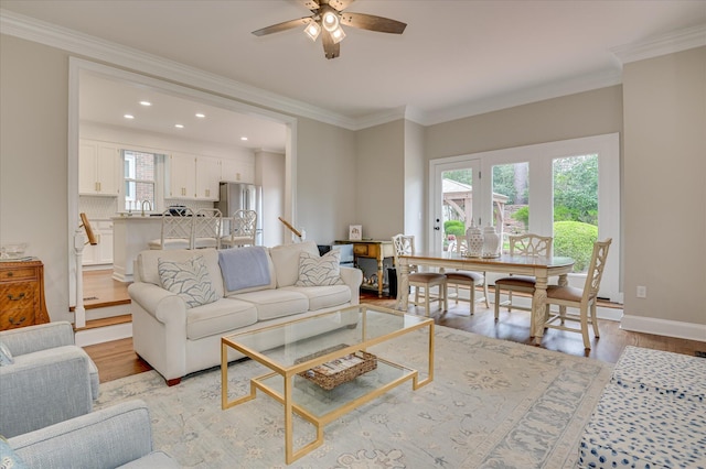 820 Barrett Ln, Augusta, GA 30909 - living area with light wood-style flooring, a ceiling fan, crown molding, recessed lighting, and baseboards
