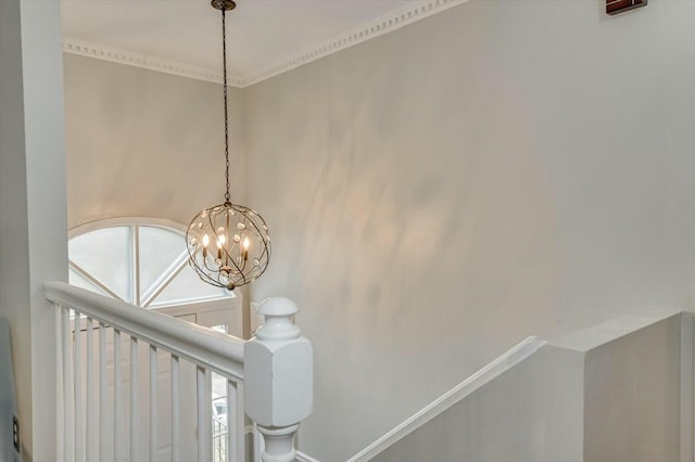 interior details featuring a notable chandelier