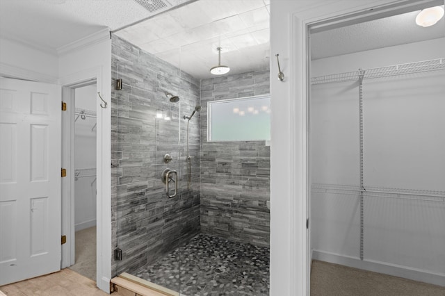 922 Windmill Ln, Evans, GA 30809 - bathroom featuring a stall shower, a spacious closet, and crown molding
