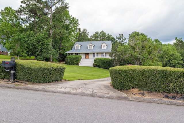 922 Windmill Ln, Evans, GA 30809 - cape cod-style house featuring a front yard and metal roof