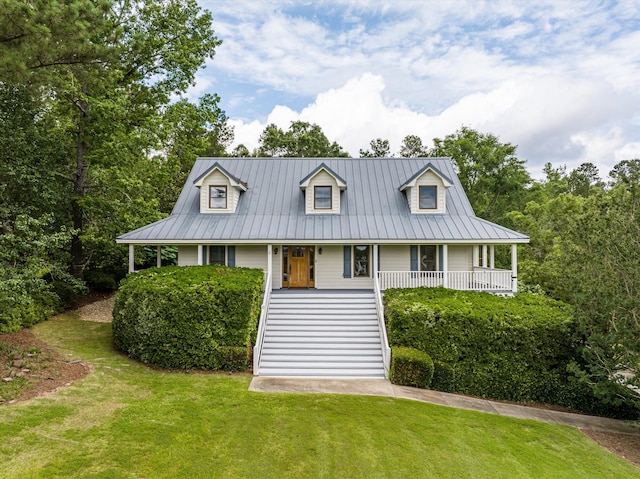 922 Windmill Ln, Evans, GA 30809 - view of front of house featuring a front yard, covered porch, and metal roof