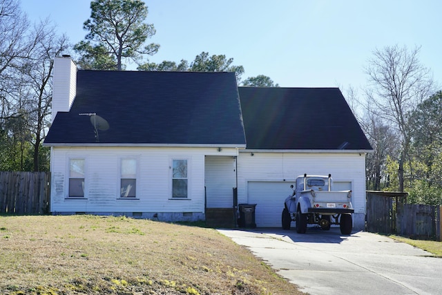 view of front of house with crawl space, driveway, a chimney, and fence