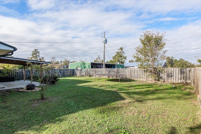 2872 Ga Highway 102, Wrens, GA 30833 - view of yard with a patio and a trampoline