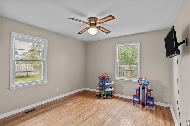 2872 Ga Highway 102, Wrens, GA 30833 - rec room featuring ceiling fan and light hardwood / wood-style floors