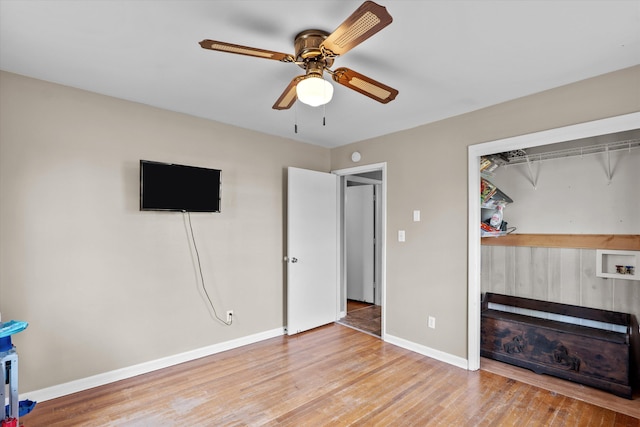 2872 Ga Highway 102, Wrens, GA 30833 - unfurnished bedroom with ceiling fan, light hardwood / wood-style floors, and a closet