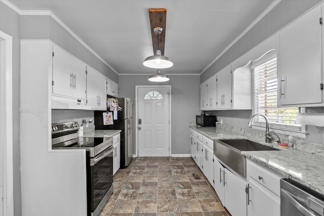 2872 Ga Highway 102, Wrens, GA 30833 - kitchen featuring stainless steel appliances, white cabinetry, ornamental molding, and sink