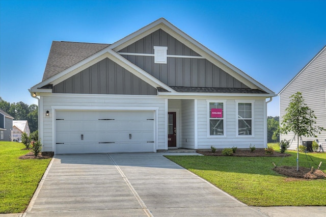 2015 Saylor Ln, Grovetown, GA 30813 - view of front of property with board and batten siding, driveway, a front yard, and a shingled roof