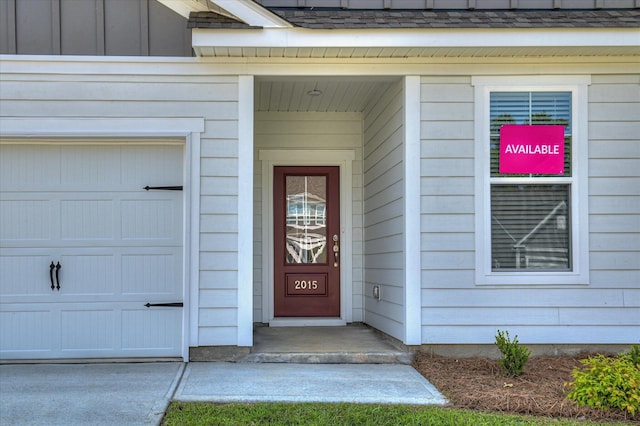2015 Saylor Ln, Grovetown, GA 30813 - property entrance with a garage and board and batten siding