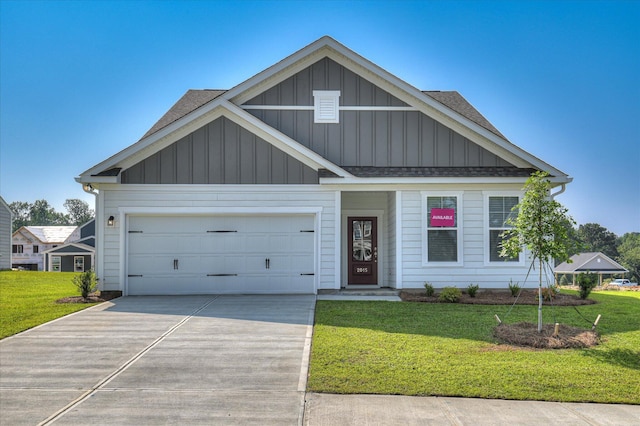 2015 Saylor Ln, Grovetown, GA 30813 - view of front of property featuring board and batten siding, roof with shingles, and a front yard