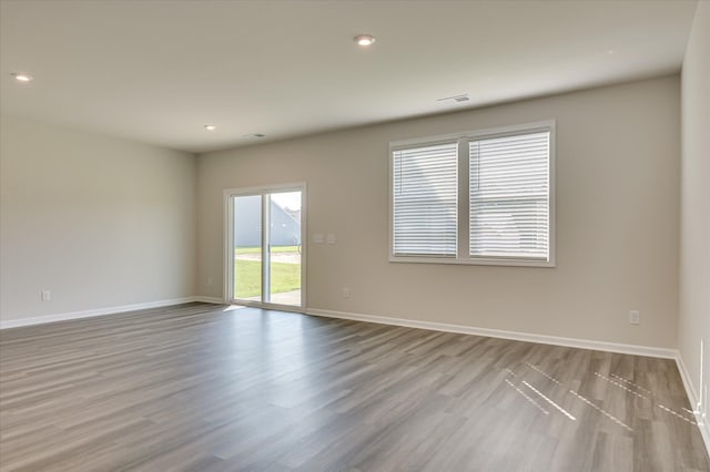 2015 Saylor Ln, Grovetown, GA 30813 - unfurnished room featuring wood finished floors, baseboards, and recessed lighting