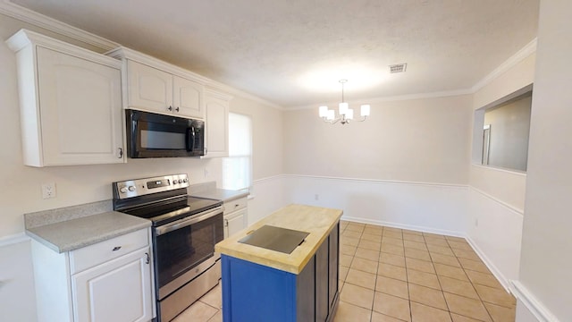 kitchen featuring stainless steel range with electric cooktop, white cabinets, black microwave, crown molding, and a chandelier