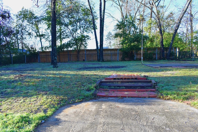 view of yard featuring fence