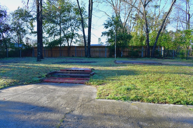 view of yard featuring fence