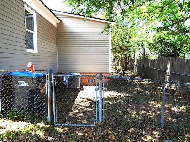 fenced yard featuring a gate