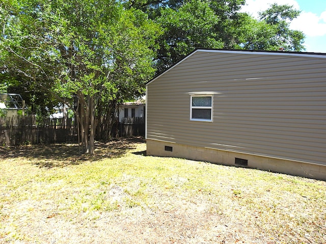 view of side of property featuring crawl space
