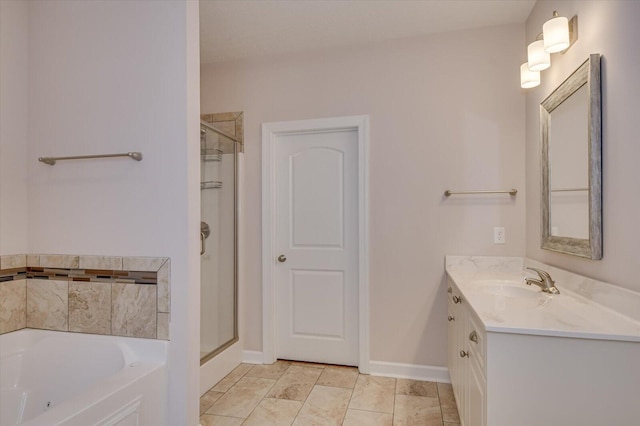 bathroom featuring vanity and shower with separate bathtub