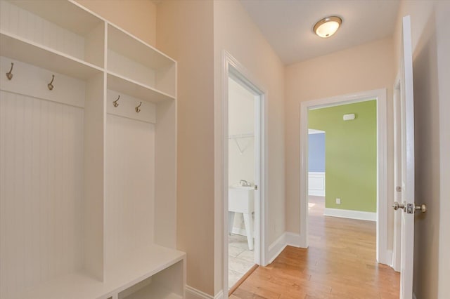 mudroom with light wood-type flooring