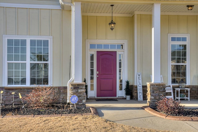 property entrance featuring covered porch