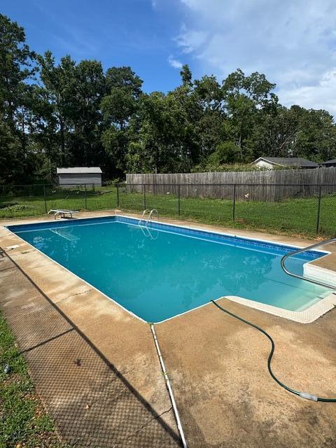 6183 Columbia Rd, Appling, GA 30802 - view of pool with a fenced backyard and a patio area
