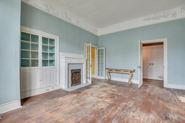 818 Academy Ave, Waynesboro, GA 30830 - unfurnished living room with wood finished floors and a fireplace