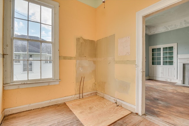 818 Academy Ave, Waynesboro, GA 30830 - unfurnished room with hardwood / wood-style floors and healthy amount of natural light