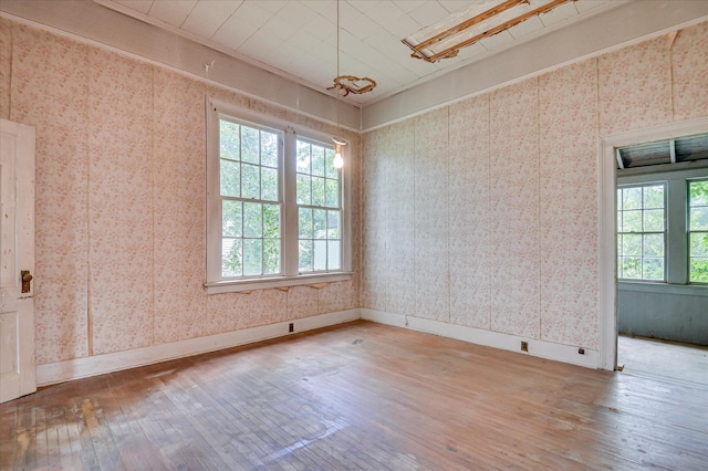 818 Academy Ave, Waynesboro, GA 30830 - unfurnished room featuring hardwood / wood-style flooring and wallpapered walls